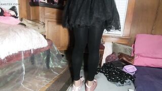 Cute T-angel in frilly suit and ebony tights showing off her toenail polish