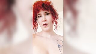 Glamorous trans redhead dommy mama showing off her piercings