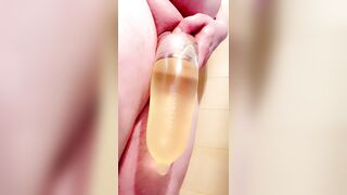 Small Transsexual shlong fills jo-bag with golden urinate