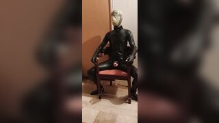 Latex Sissy vibrates in self slavery with chastity and breathplay