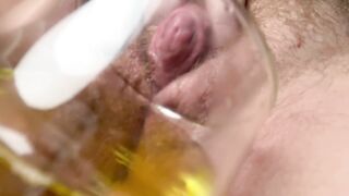 Large Erected Love button Peeing In Glass After Climax