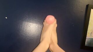 POV giving a knotty vibrator a footjob