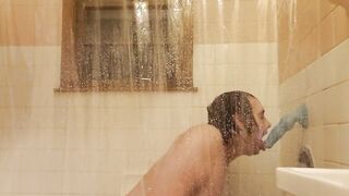 Sucking a bad dragon toy in the shower
