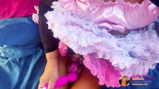 girl ebony wanks her caged clitty with a wand