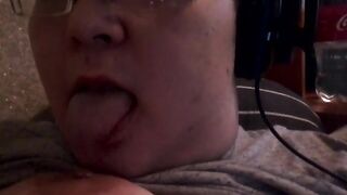 Licking own teat