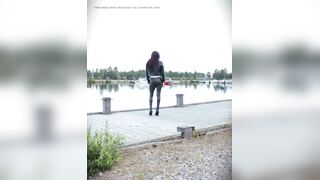Walking in full leather outfit and heels.