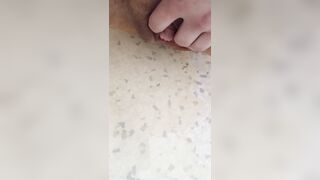 A valuable relaxing pee on the wall and floor