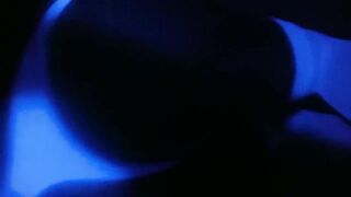 Crossdresser below UV light