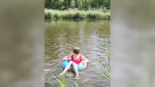 Annemieke gets wet in pink costume and sneakers