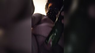 T-girl bangs her mouth and a Cucumber for joy