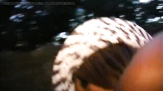 A ebony tranny sucks the penis of a masked chap in the countryside