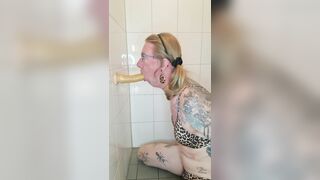 Sissy sucks sex toy