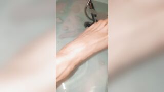 Gorgeous feet in the shower