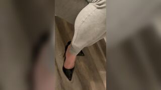 Excited Sissy in grey leggings and heels