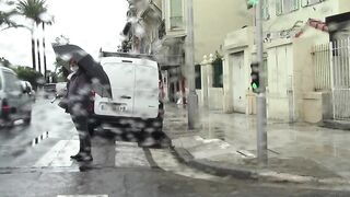 CD in the town in the rain