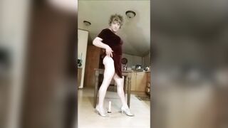 Crossdresser out of Makeup Teases in Kitchen
